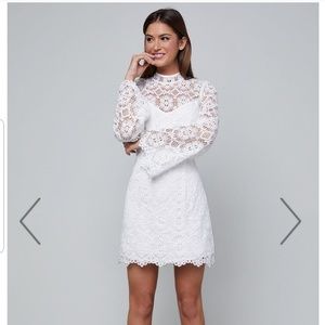 White crocheted dress with bell sleeves